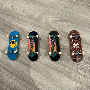 Tech Deck fingerboards collectible mini skateboards. Flip, Element, Almost.